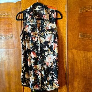 Sleeveless fall floral shirt.